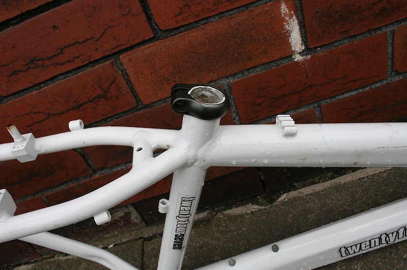 Seat clamp, original stickers, and cable guides