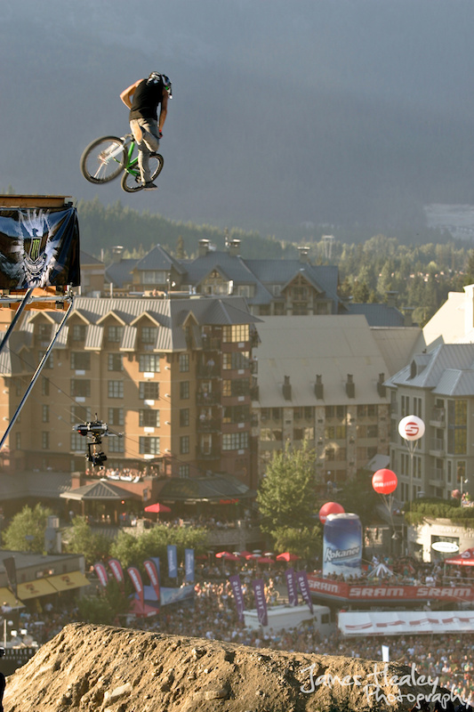 Mike Montgomery tailwhip off the drop during the slopestyle
