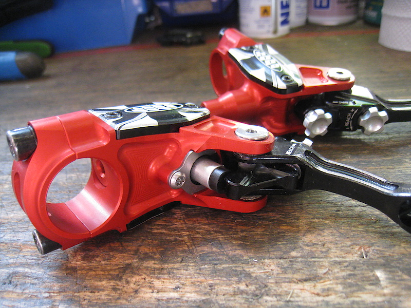 close up of my new rebuilt Hope V2 disc brake. With a beautifull red anodization.