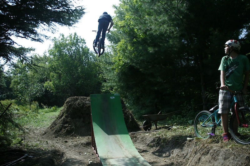Bar over the trick jump. Recklessness photo cred!