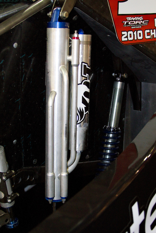 Look at the dampers though! 301 feet is a mega distance, and when you're in a truck you gotta make sure you're going to survive the impact. Looks like these massive Fox Shox should do the job.