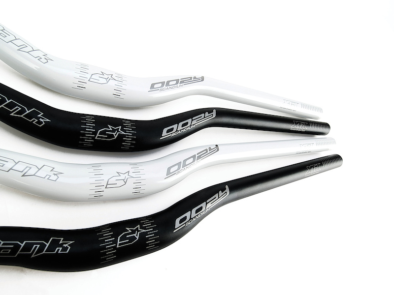 The new Oozy Ltd handlebar tips the scales at a svelte 208 grams, yet still meets and exceeds all of the CE tests that it is put through. The bar is built using some interesting technology, including Spank's 3D CNC Bending process that is said to do a much better job of limiting material damage during the bar's shaping. The Oozy Ltd also features some interesting shaping and a closer look reveals a taper from the clamping zone that carries on gradually through the bend zones and to the control clamping areas. What you can't see from the outside is the internal bar thickness increasing as it reaches the end of the bar, a spot that sees a lot of abuse from bikes falling out of the air or being dropped. The 700 mm wide Oozy Ltd is available in three different rises, 5, 15, and 30mm, and your choice of either black or white.