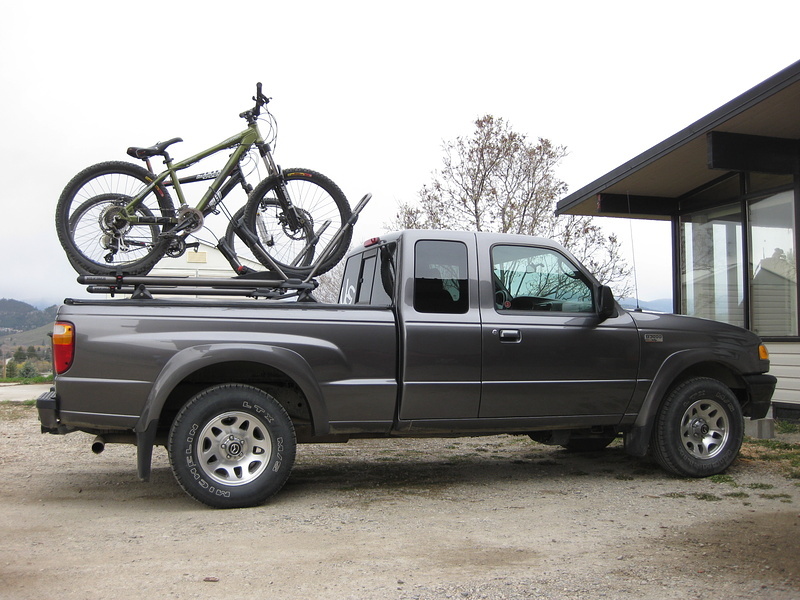 Bikes loaded on Yakima HighRoller. Mounted on a Yakima crossbars with custom mounted Control Towers.