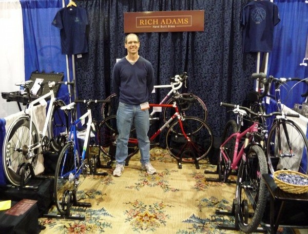 Rich at the show displaying the bike my husband Dave had made for me for my 27th birthday.

Featured in DirtRag Issue 148, page 25.

A Victoria's Secret Pink 29er single speed.  Paint color chosen to match my undies!  lol