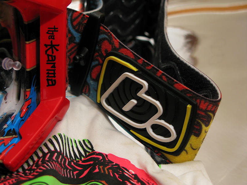 As fit is personal, so is coloring and there should be something available to suit all tastes; from the slightly subdued black Phobia to the far more wild and lurid red Karma (both featured here). Graphics extend from the painted frames onto the straps with matching rubber logo on the left hand side, all wrapped up in a similarly decorated microfiber bag.