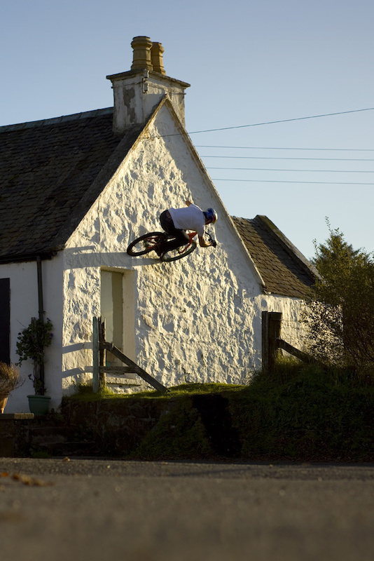 Riding the bakery wall in his hometown of Dunvegan on the Isle of Skye.