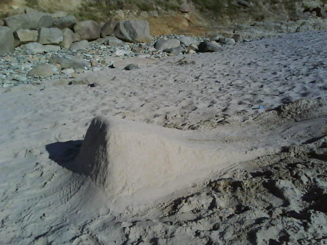 Built sender out of sand on beach
