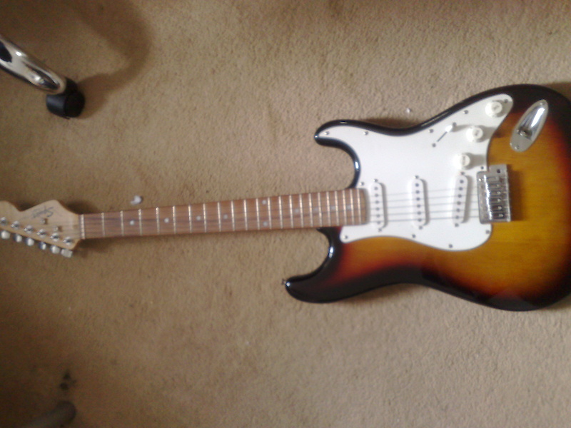 Fender Squire Strat. Sunburst about 2/3 years old but still in good condition. Swap or sale.