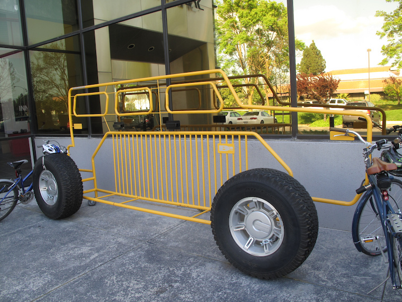 The massive bike rack outside the front door is another give away. Employees are encouraged to not only ride to work every day (<i>there is staff parking inside as well</i>), but also take part in the lunch rides.