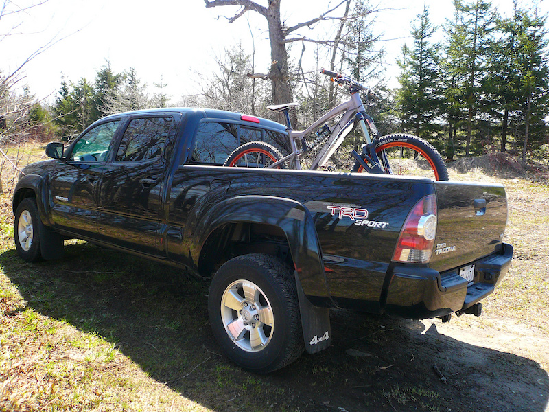 transporting bicycle in pickup truck