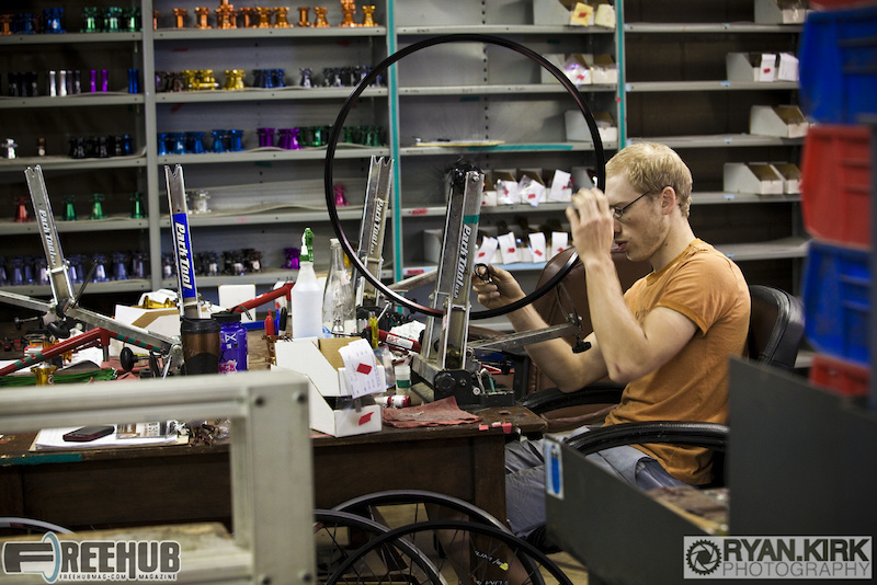 Wheel builder Brandi Groff working hard in Asheville, NC at Industry Nine.