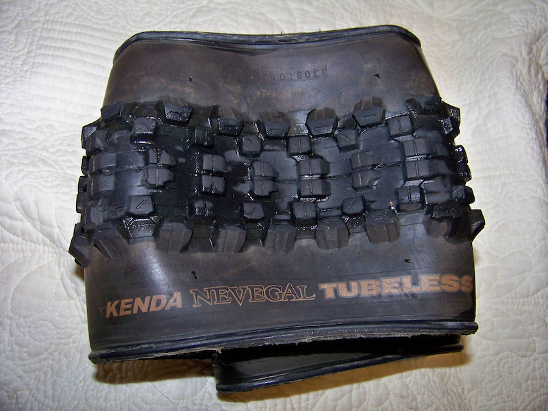 26" UST Tubeless Kenda Nevegal 2.35 tires with lots of life left.