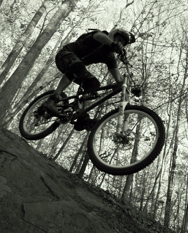 My best bud Brook hitting a rock drop. I love this photo... worked out perfect. Single frame shot too.