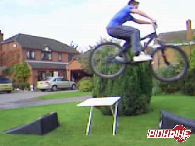 jumping over picnic table (sorry about quality taken from video)