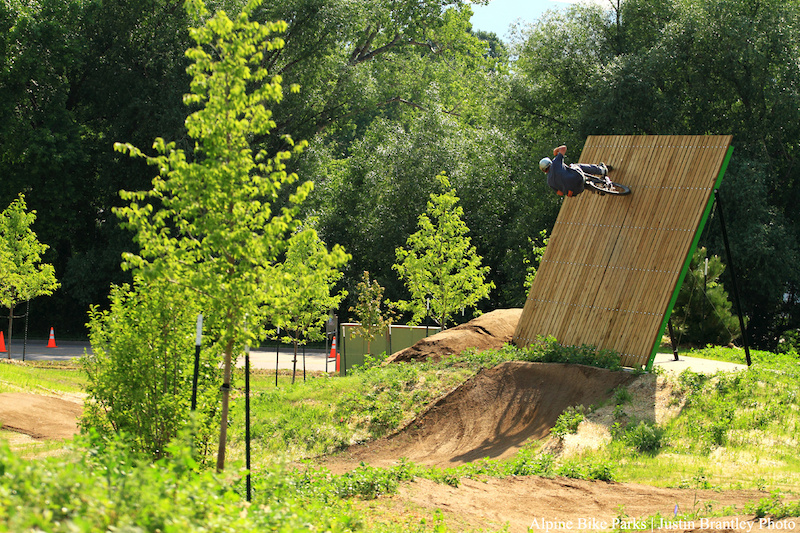 Opening day at the Valmont Bike Park. Cob getting to the top of the wall at the bottom of the XL line 