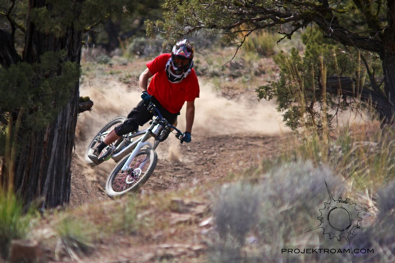 Colt Maule slashing a dry, dusty berm while riding in Redmond, OR.