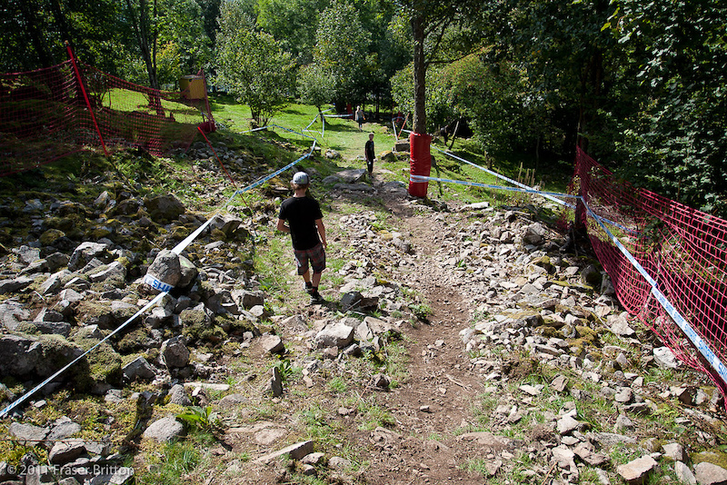 The tight left leads into a mini alley and then into a rocky chute into the trees.