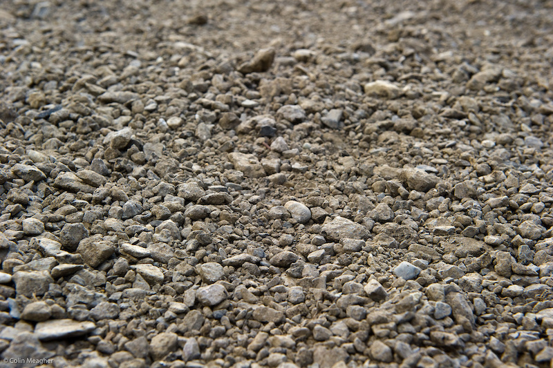 There is a load of loose over hard gravel in the last few jumps on the way down to the finish line. It looks a bit sketchy but racers who ve trained on the track didn t seem to mind.