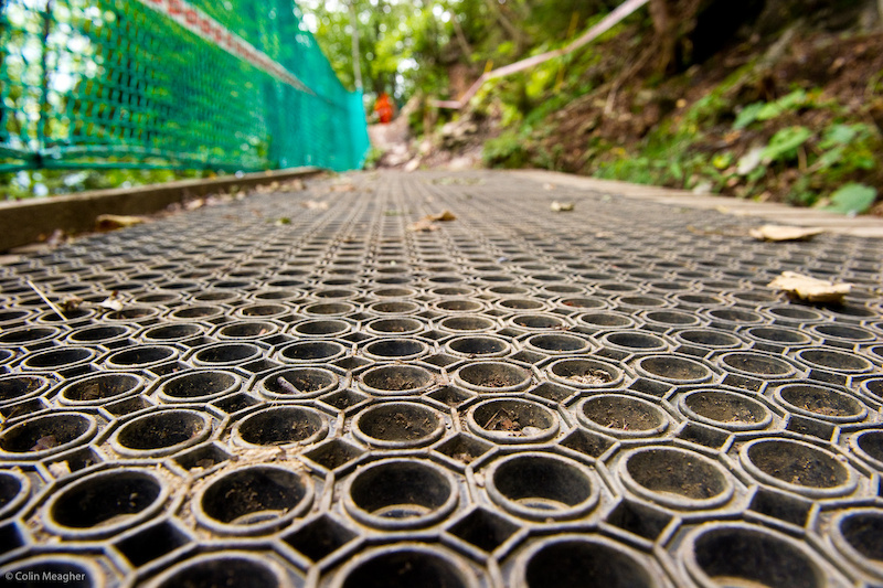 And wherever there s been a wooden bridge of some kind course marshals have kindly laid down these matts of not exactly confidence inspiring rubber for traction.