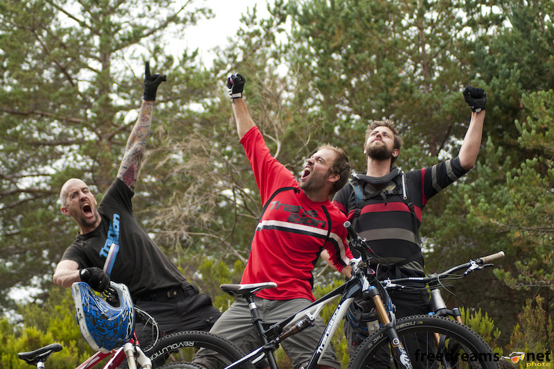 Kevin Menard Kyle Young and Sam Burkhardt with a natural posing after the race at Manzaneda Bike Park