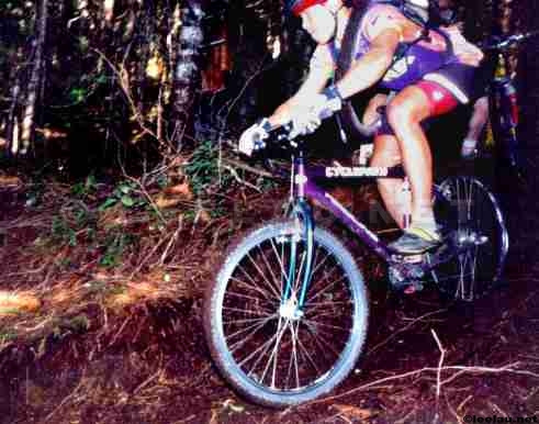 Loaner Yess alu rigid hardtail. The rear rim blew out so I rode it out on the steep with the tire around my neck. Upper Powersmart. Squamish 1996
