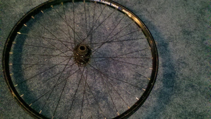 I love Free Parts. Perfect working WTB Dual Duty Front Rim. Perfect True too! Spare parts!