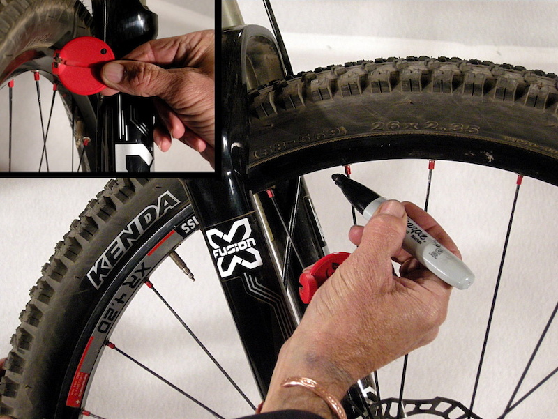 tightening spokes on mountain bike