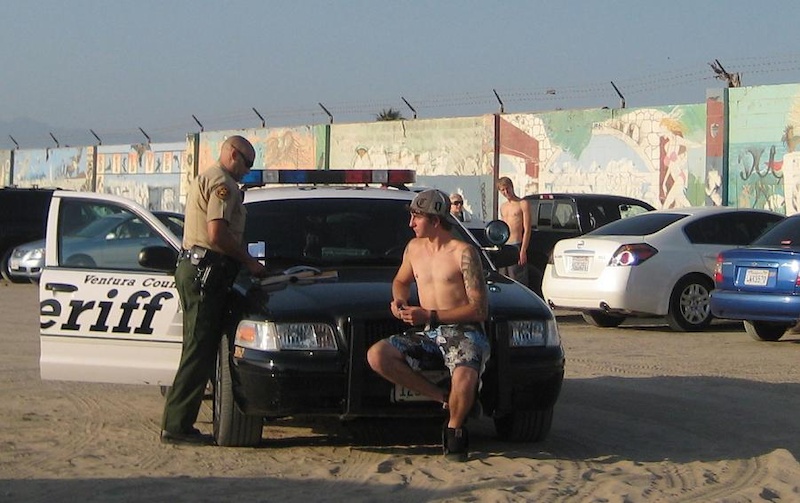 damn cop tryed to get me intruble for driivng my truck in the sand and he told me he was gonn have his K9 ( Dog eat me......