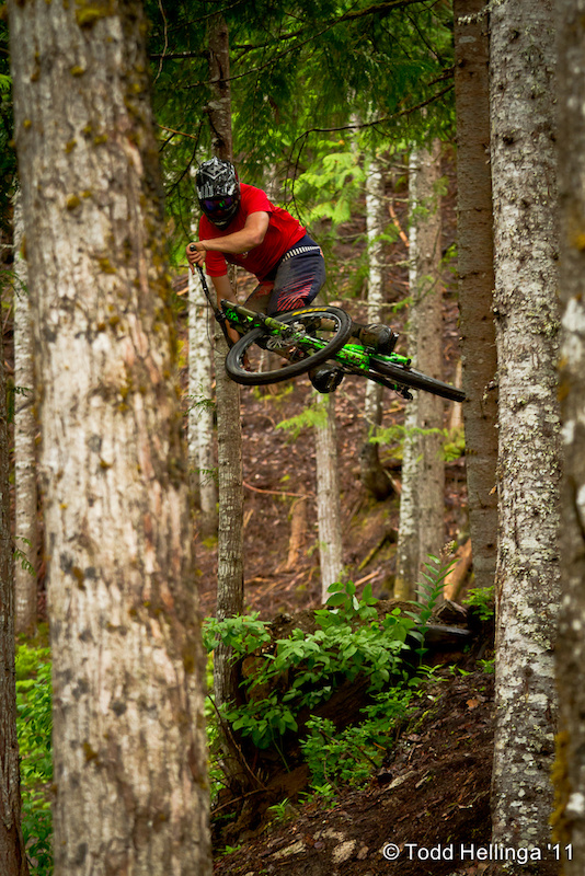 Boosting a hip in the Whistler valley during shooting for Dan Barham's Deep Summer photo show