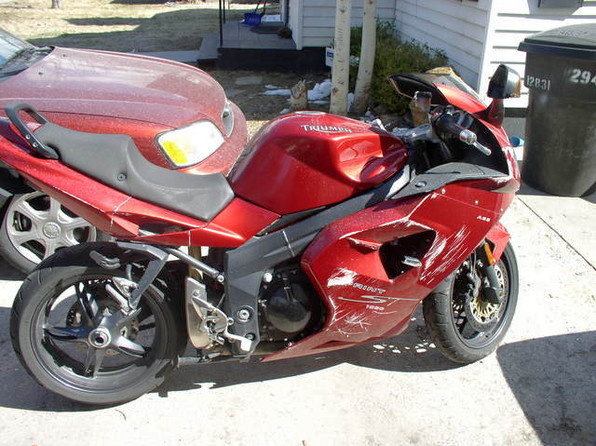 My 2008 Triumph this is what it looked like when i got it, the guy laid it down pulling in his drive way. EASY FIX!