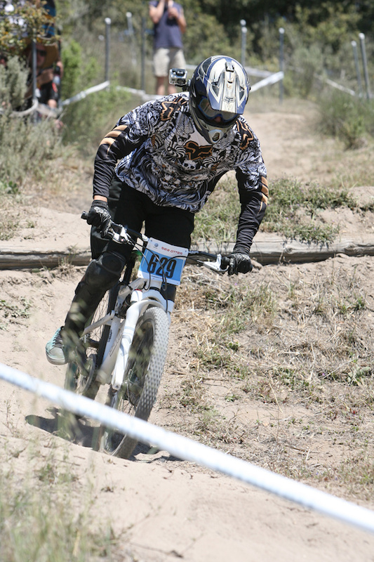 A race shot of me racing the sea otter dh on my 4x bike...it did well pretty much bottomed out on this shot