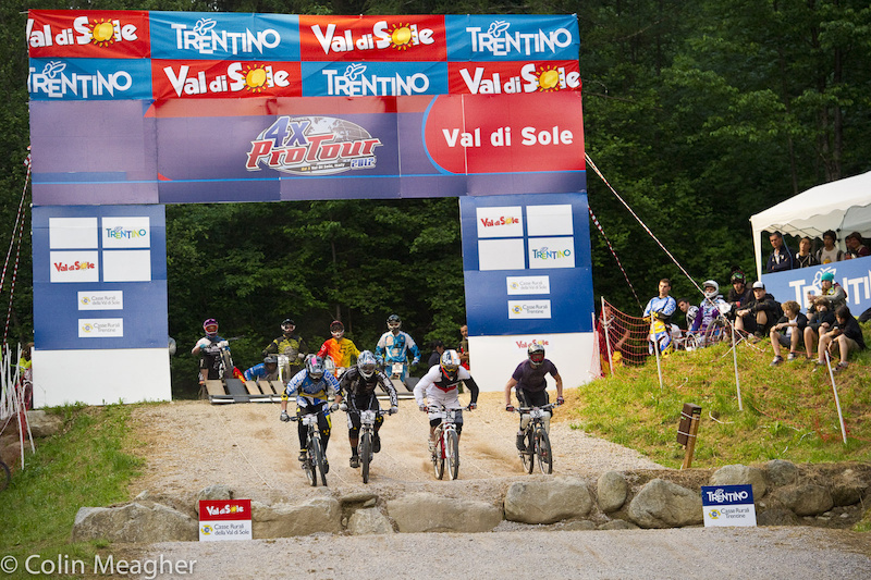 Say what you will but 4X is arguably one of the most entertaining mountain bike competitions to watch live. Qualifying on the other hand is as boring to watch as paint drying. But the actual racing is pretty damn cool to watch. You can already see Chain Reaction s Michael Machura setting up for the first corner.