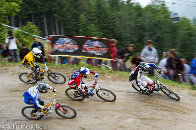 Marek Pesko leading the bunch into the first turn at Val di Sole during the first round of 4X racing.