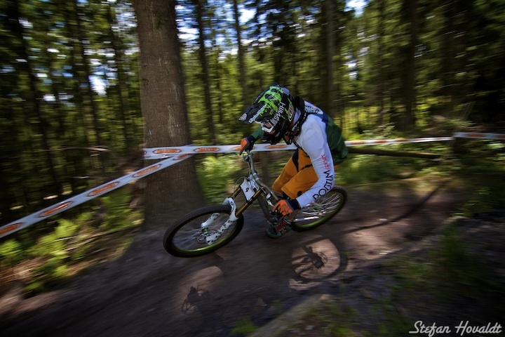 Mathias during his run at the Danish DH Cup.
Strobe on my right @1/4 power or so, zoomed at 24 mm. Triggered by RF.