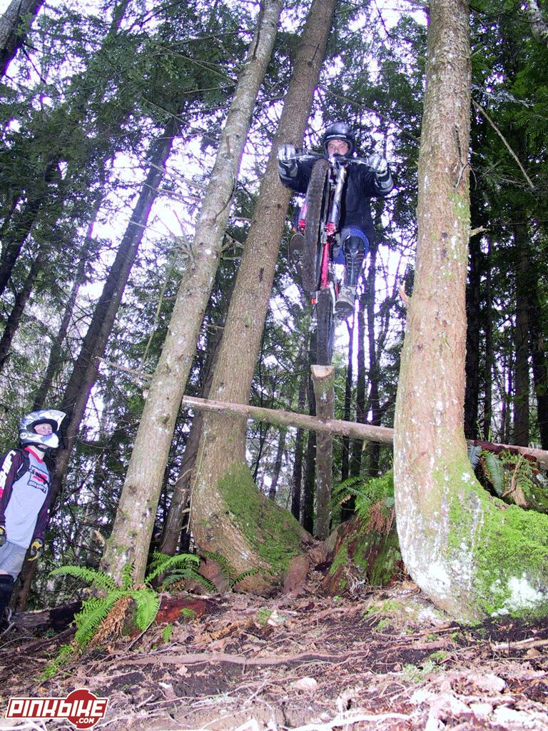 Derek Roque, Fracture Products owner rides out the 4 inch wide skinny drop while Pinkbike's Ben watches on.