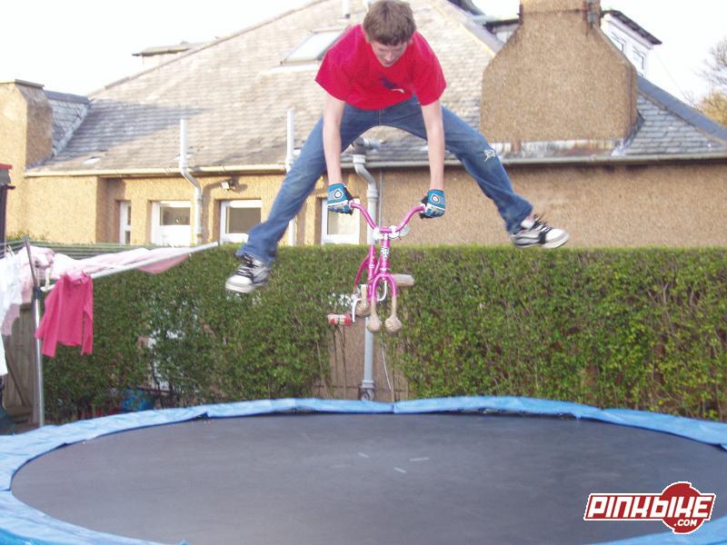 bruce doing a no footer on his tramp bike