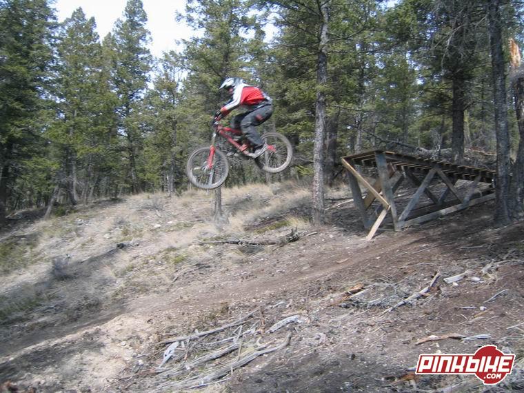A photo from early April 2005. I love this little section it's fast and flows from one gully to the next followed by a little step up that you can easily clear the landing on. Sweet!