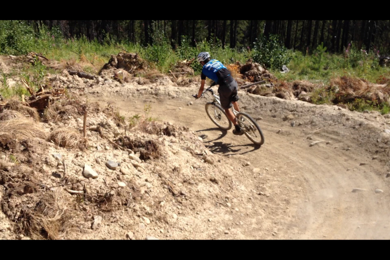 The final 2 km descent of the new trail in Kimberley, BC, Canada. Flowing singletrack on hard packed gravel with jumps and berms.