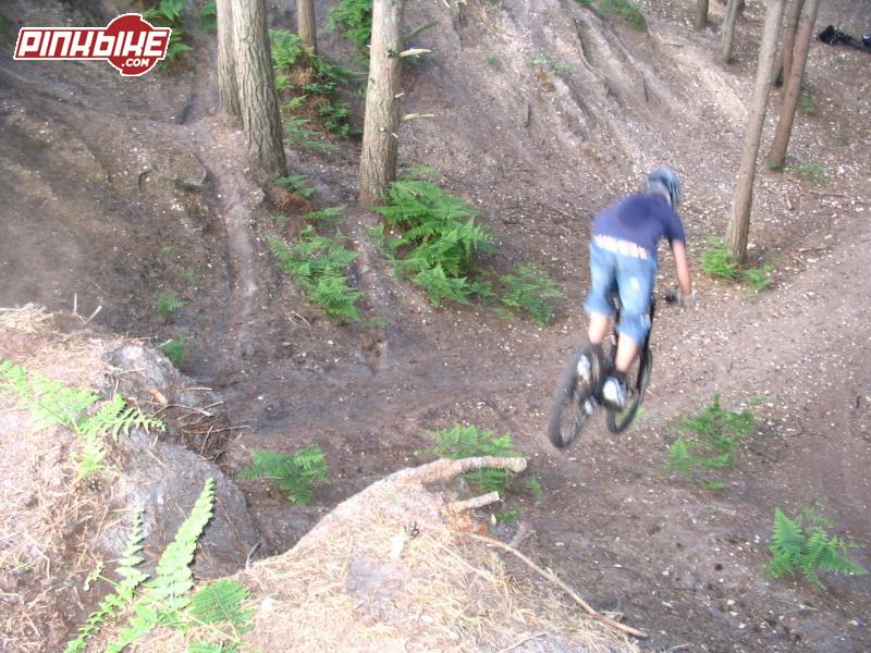 Pretty big huck, pic shows the distance (land in the ferns in front of front wheel), and a nice sweat patch.