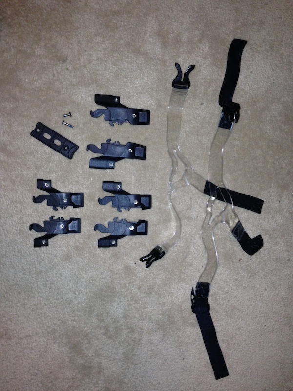 Leatt Neck Brace parts for sale. Spare medium, large, and extra large pins, 7 degree wedge with bolts, and chest straps.