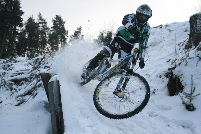 Team Aston Hill rider Glenroy  roosting in the snow
