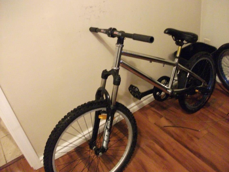 the bike I was riding up to a week ago need picture of my new bike :D yea this is a bmx I threw shocks on lol