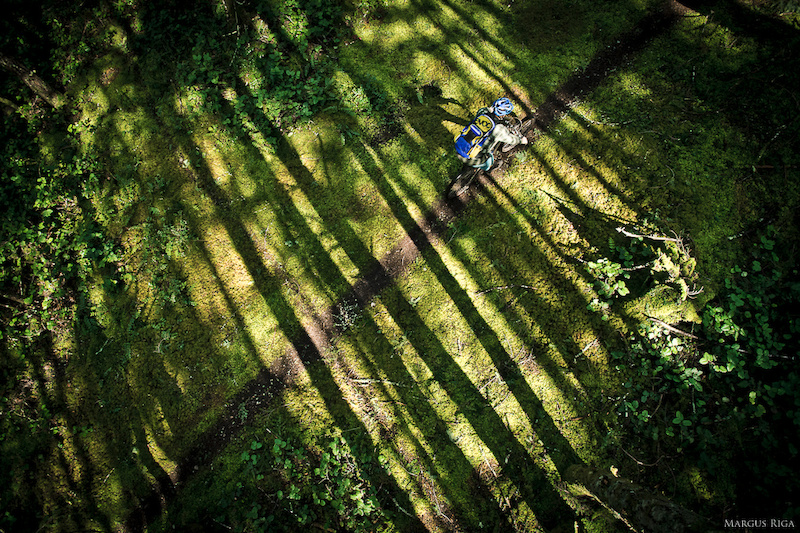 To get this shot, Margus Riga spurred his way up a fir tree, swaying gently in the wind as Riley McIntosh speeds by.