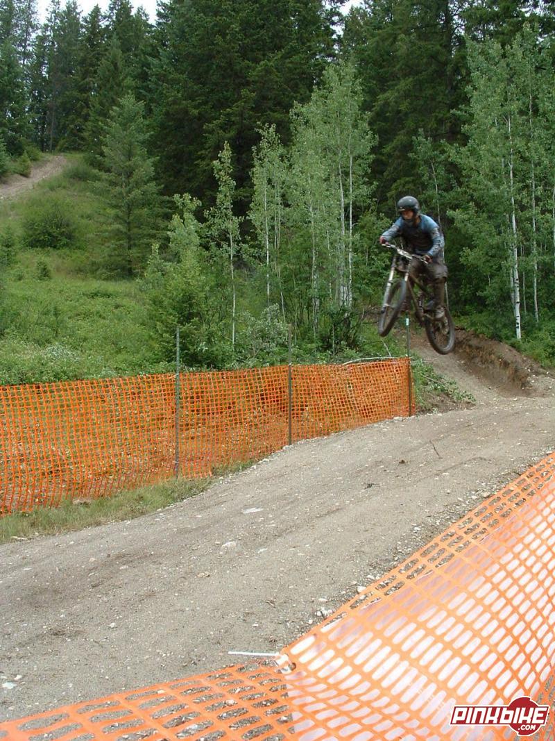 Someone going off the new jump at the end of the course. Photo taken by Ron Oszust.
