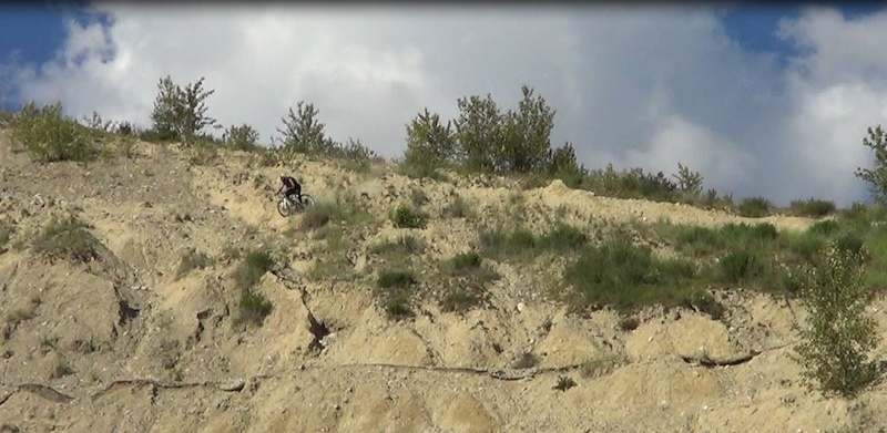 Saw this slope behind a gas station in Golden, had to hit it, but it was near unrideable with rock hard dirt and pebbles.