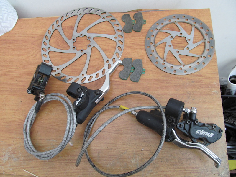 Clim8 brakeset, 203 front, 150mm rear.
inc 2sets ofspare pads.