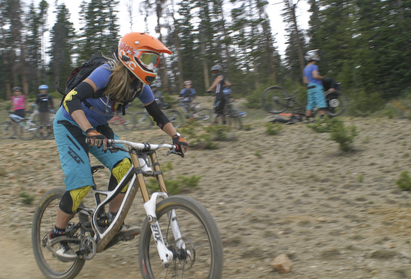 While fixing a flat we took the opportunity to watch Lindsay fly through turns and session it as a group.