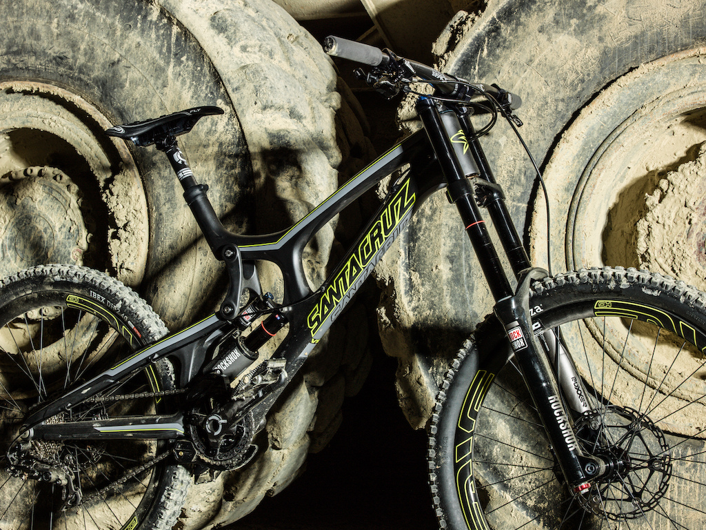 Parts:
- V10 2013 full carbon (World Champion!) frame 
- Enve DH rims laced to DT 240 hubs
- RS Boxxer with uppers from MRC trading
- RS Vivid air
- Raceface Sixc DH crank, bar and seatpost
- Hope top crown and Race X2 brakes
- X0 Shifter and derailleur
- Straitline AMP pedals
- E13 LG1+ chainguide
- SDG I FLY Storm
- ESI grips
- Onza Ibex tires