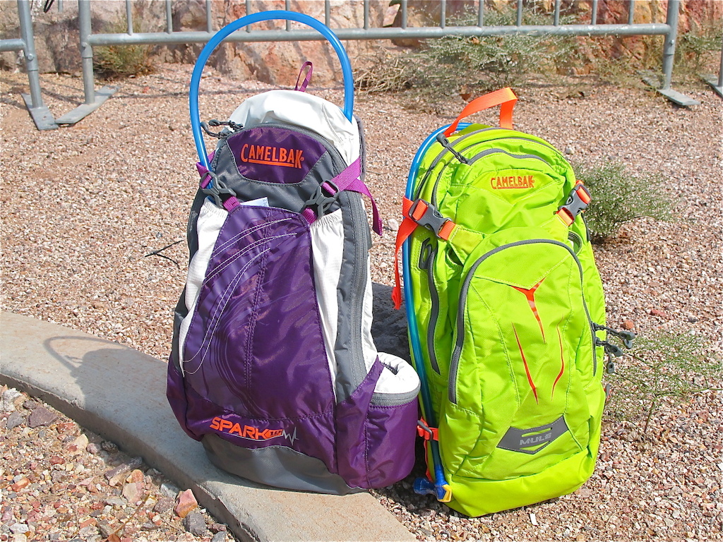 Camelbak's line up of hydration packs covers the widest gamut possible. Here are some fun new colors for the ladies and guys for 2014. The 10L Spark in Imperial Purple/Graphite for the girls (Left) and the M.U.L.E. in Lime Punch for the guys/unisex (Right)