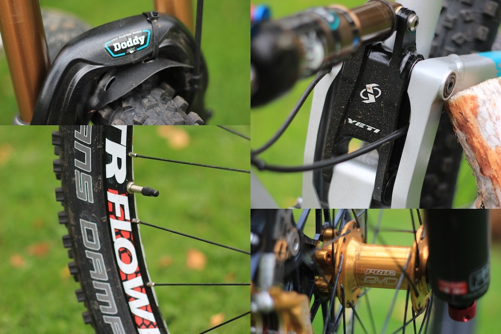 Custom fork bridge name decal, Stans flow rims on Hope pro2 evo gold hubs, Schwable hans dampfs, yeti hardware